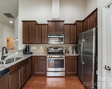 5826 Castlecove Road - Photo Thumbnail 5
