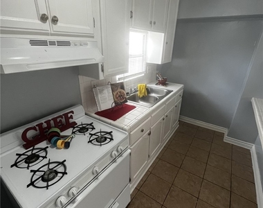 4520 S Normandie - Photo Thumbnail 2