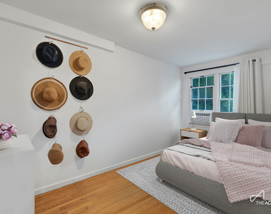 242 W 21st Street - Photo Thumbnail 3