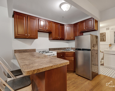 242 W 21st Street - Photo Thumbnail 2