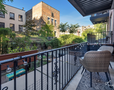 242 W 21st Street - Photo Thumbnail 4