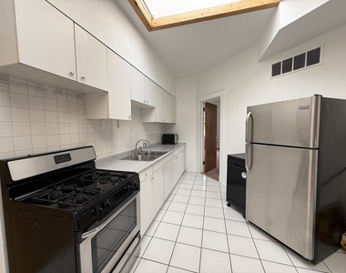 1524 W Jarvis Avenue - Photo Thumbnail 7