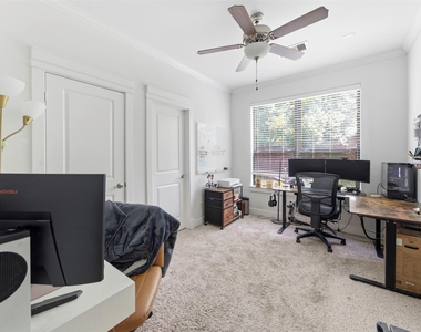 214 W 28th Street - Photo Thumbnail 3