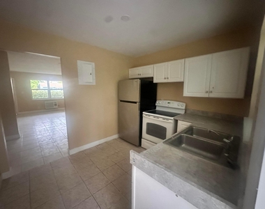 5644 Nw 14th Court - Photo Thumbnail 2
