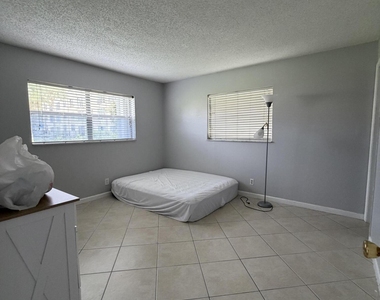 9915 Sandalfoot Boulevard - Photo Thumbnail 12