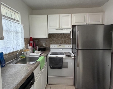9915 Sandalfoot Boulevard - Photo Thumbnail 3