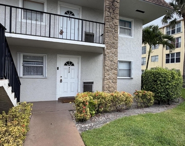 9915 Sandalfoot Boulevard - Photo Thumbnail 2