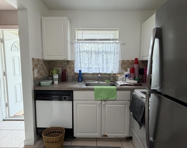 9915 Sandalfoot Boulevard - Photo Thumbnail 4