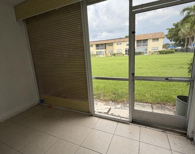 9915 Sandalfoot Boulevard - Photo Thumbnail 11