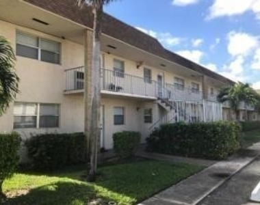 9915 Sandalfoot Boulevard - Photo Thumbnail 1