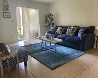 4096 N Pine Island Road N - Photo Thumbnail 8