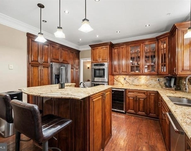 12104 Guinevere Place - Photo Thumbnail 7