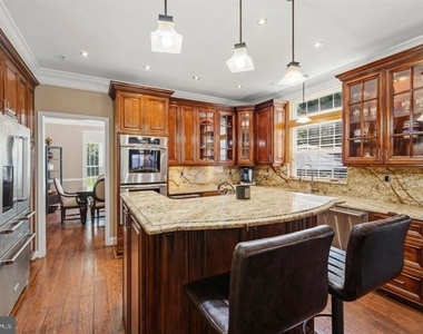 12104 Guinevere Place - Photo Thumbnail 6