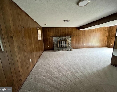 15705 Anamosa Drive - Photo Thumbnail 15