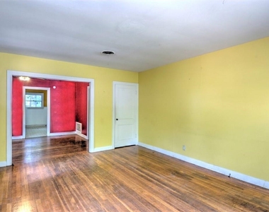 1004 E 38 1/2 St - Photo Thumbnail 2