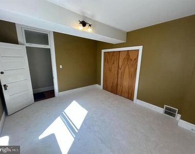 105 E West Street - Photo Thumbnail 28