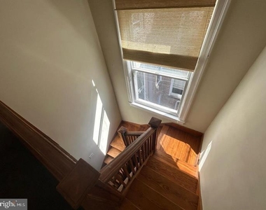 105 E West Street - Photo Thumbnail 31