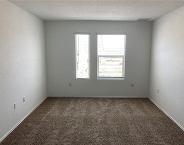 7204 Dancing Wind Ln - Photo Thumbnail 6