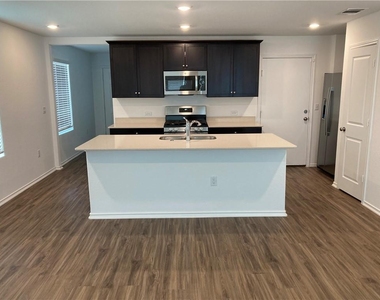 7204 Dancing Wind Ln - Photo Thumbnail 4