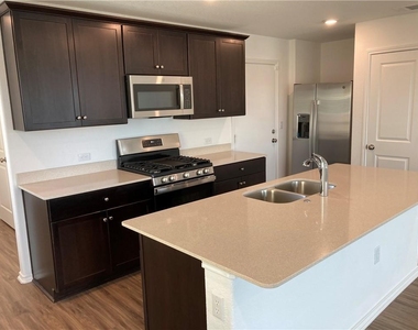 7204 Dancing Wind Ln - Photo Thumbnail 3
