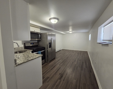 5718 W Melrose Street - Photo Thumbnail 3