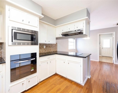 8323 Forest Ridge Road - Photo Thumbnail 3