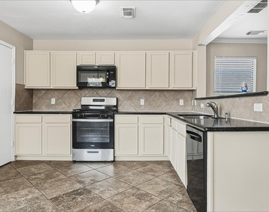 11411 Seven Sisters Drive - Photo Thumbnail 1