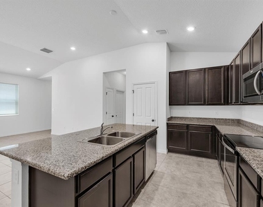 7608 Sunshine Bridge Avenue - Photo Thumbnail 6