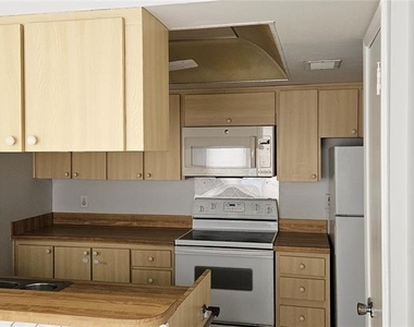 2617 Cove Cay Drive - Photo Thumbnail 2