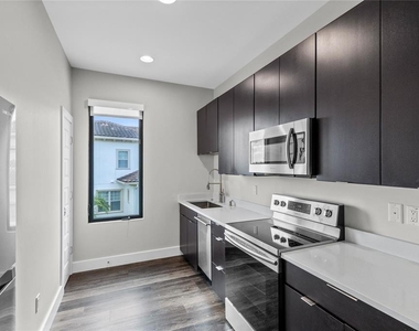 14105 Corrigan Avenue - Photo Thumbnail 1