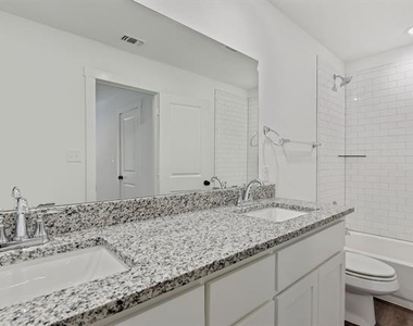 103 E Bond Street - Photo Thumbnail 15