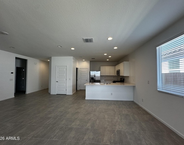 9819 W Flower Street - Photo Thumbnail 3