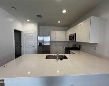 9819 W Flower Street - Photo Thumbnail 5