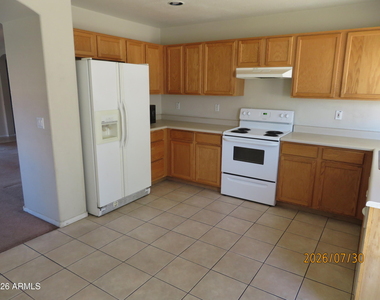 15446 W Gelding Drive - Photo Thumbnail 21