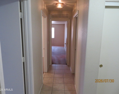 15446 W Gelding Drive - Photo Thumbnail 7
