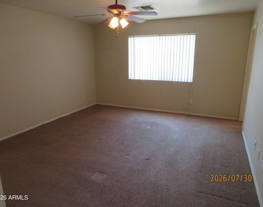 15446 W Gelding Drive - Photo Thumbnail 10
