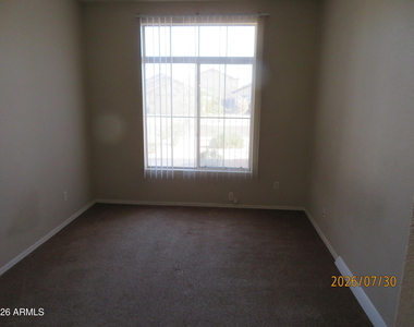 15446 W Gelding Drive - Photo Thumbnail 18