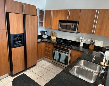 1551 N Flagler Drive - Photo Thumbnail 4