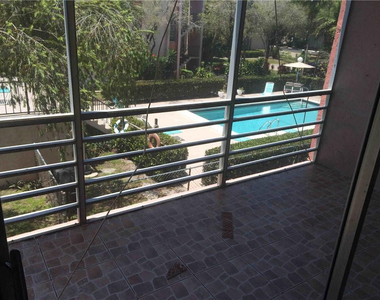 485 N Pine Island Road - Photo Thumbnail 18