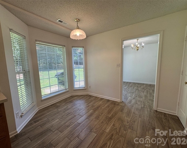4412 David Cox Road - Photo Thumbnail 5
