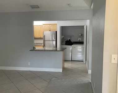 9037 Se Hobe Ridge Avenue - Photo Thumbnail 3
