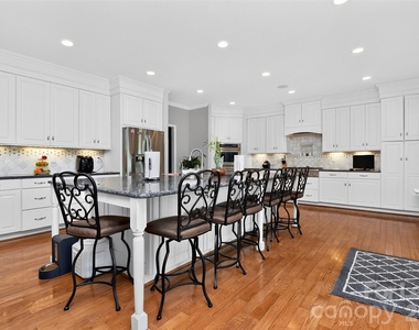 9704 Saddle Avenue - Photo Thumbnail 1