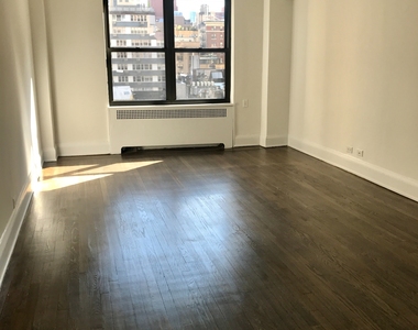 East 38th St - Photo Thumbnail 9