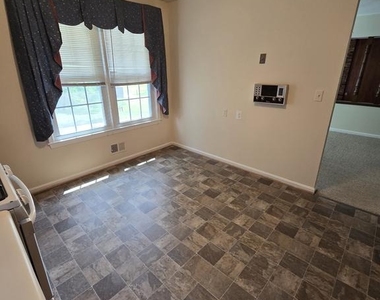 11710 North Marlton Avenue - Photo Thumbnail 11