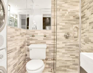 West 52 Street - Photo Thumbnail 2