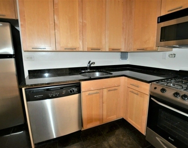 East 49 Street - Photo Thumbnail 2