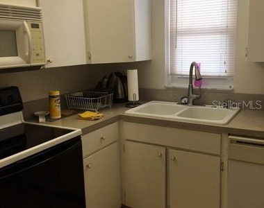 7625 Sun Island Drive S - Photo Thumbnail 4