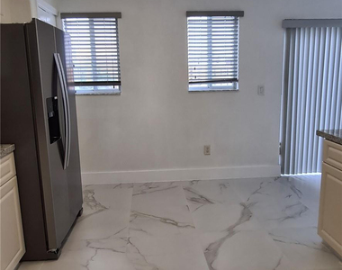 7301 Nw 173rd Drive Nw - Photo Thumbnail 6