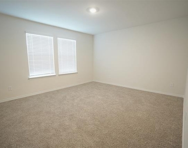7005 Cottonseed Drive - Photo Thumbnail 3
