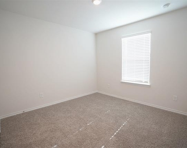 7005 Cottonseed Drive - Photo Thumbnail 7